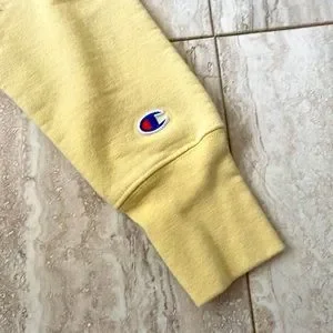 Pastel yellow champion jumper on sale